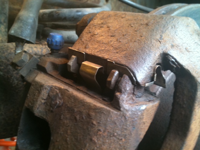 Ford brake caliper retaining clip removal #10